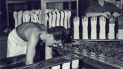 Gloves being handdipped for Sempermed 