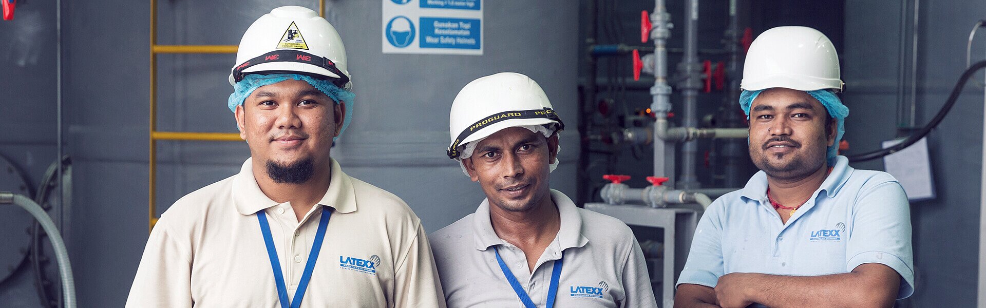 Happy workers at Latexx Partners Berhad